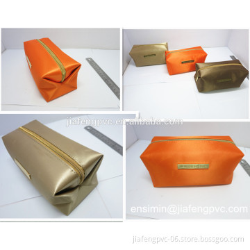 Satin hand bag with matel logo plaque for women